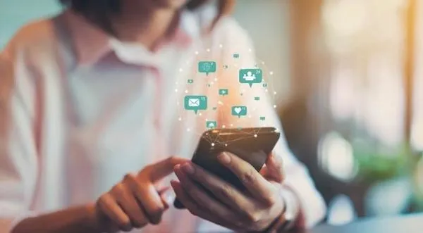 woman using cloud on phone